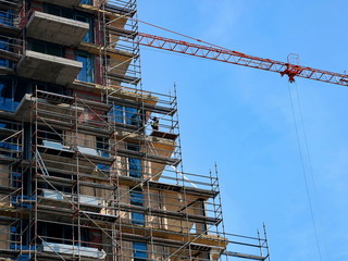 Workers on the edge of the building
