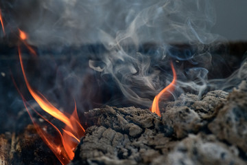 burning and smoking coals