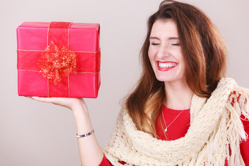 Woman with red christmas gift box