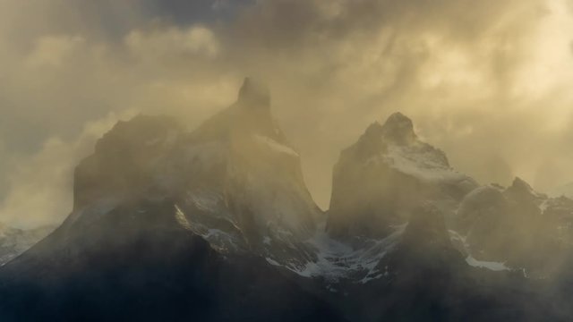View of Torres Mountains in the Torres del Paine National Park during sunrise. Autumn in Patagonia, the Chilean side