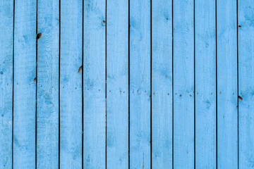 Close up of a blue wooden Fence