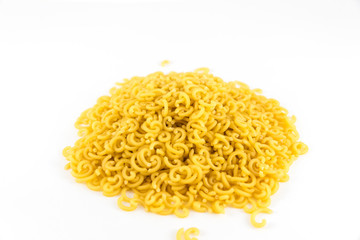 Raw pasta fideuà on white background