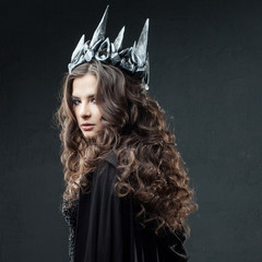 Portrait of a Gothic Princess. Gothic Queen. Image on Halloween. Young beautiful woman in black