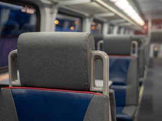 Head rest on seat in an empty train cabin