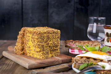 Grain bread . Fitness food. The egg with egg for breakfast and a glass of water. Place for text