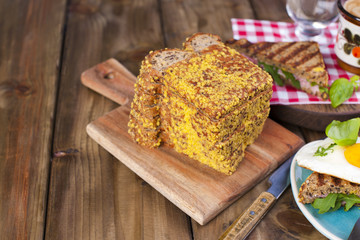 Toast with egg and bacon. Fitness bread. Healthy eating. Tasty breakfast. Wooden background and space for text