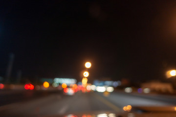 Multicolored defocused bokeh blurry lights. Abstract blur defocus bokeh background of car light...