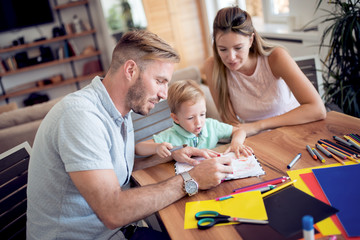 Mom,dad and son draw