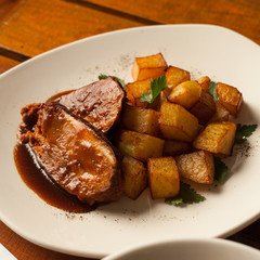 grilled meat with fried potatoes