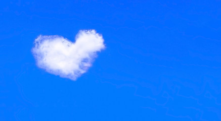 Cloud in the shape of a heart in a blue sky