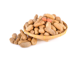 whole and peeled roasted peanut in bamboo basket and on white background