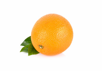 whole fresh Navel orange with leaf on white background