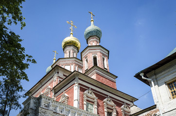 Fototapeta na wymiar Russian Orthodox monastery church in sunny weather blue sky