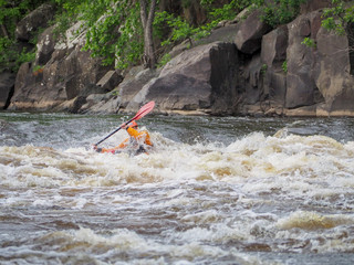 Whitewater kayaking- navigating through the rapids