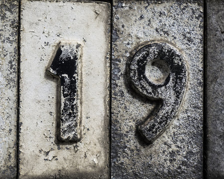 Written Wording in Distressed State Typography Found Number 19 nineteen