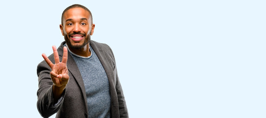 African american man with beard raising finger, is the number three isolated over blue background