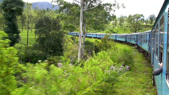 Passenger view of a classic train of Sri Lanka, on a trip in rural countrysides from Ella to Nuwara Elia. A must every visitor do.