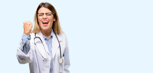 Young doctor woman, medical professional irritated and angry expressing negative emotion, annoyed with someone