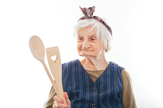 Senior Woman Holding Rolling Pin