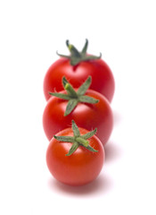 Fresh Red Cherry Tomatoes on a White Background