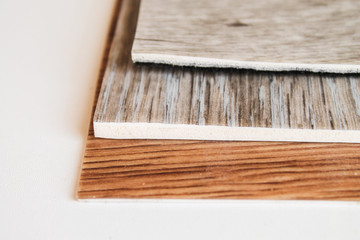 Naklejka na ściany i meble Types of linoleum of different thicknesses