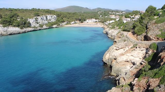 Landscape of the beautiful bay of Cala Estany d'en Mas with a wonderful turquoise sea, Cala Romantica, Porto Cristo, Majorca, Spain