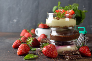 Different summer cheesecakes in jars