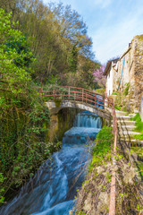 Tagliacozzo, Italy - A small pretty village in the province of L'Aquila, in the mountain region of Abruzzo, during the spring. Here the torrent in the historic center.