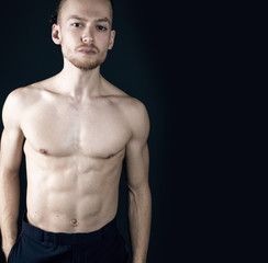 Fototapeta premium Young ginger topless man studio portrait
