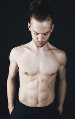 Fototapeta premium Young ginger topless man studio portrait