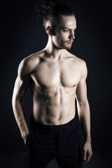 Fototapeta na wymiar Young ginger topless man studio portrait