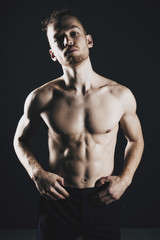 Fototapeta premium Young ginger topless man studio portrait
