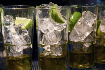 Ice and lime in the cocktail glass