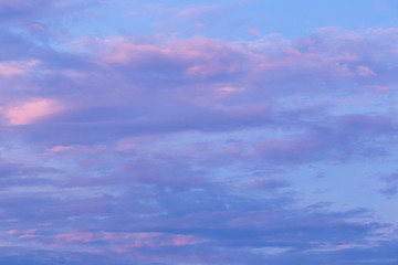 Blue sky background with white clouds, rain clouds on sunny summer or spring day.