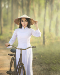 Beautiful woman with Vietnam culture traditional dress,traditional costume ,vintage style,Vietnam