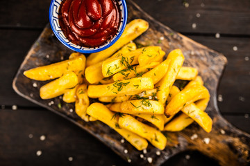 French fries on wooden table