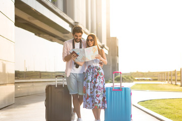 The beautiful little couple are waiting to board the plane.