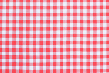 Red classic checkered tablecloth texture, background with copy space