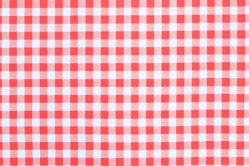 Red classic checkered tablecloth texture, background with copy space 