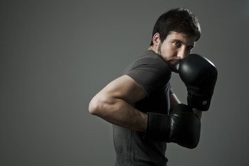 Young man with boxing gloves