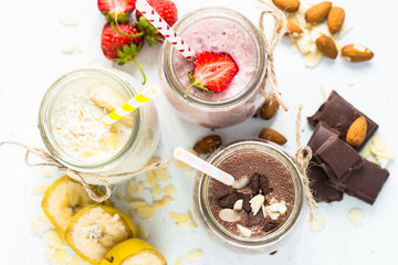 Banana chocolate and strawberry milkshakes