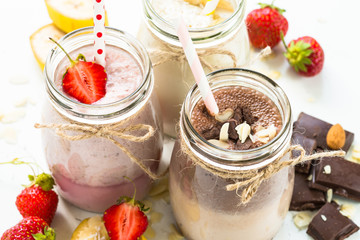 Banana chocolate and strawberry milkshakes