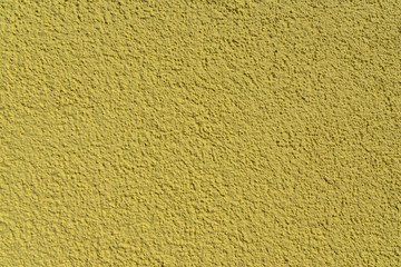 dark yellow cement wall with structure