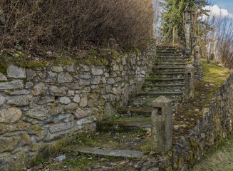Fototapeta na wymiar Old stairs near church in Horni Slavkov town