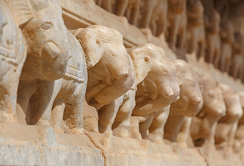 row of elephants carved on wall of Meera Krishna Temple in Jaipur, India