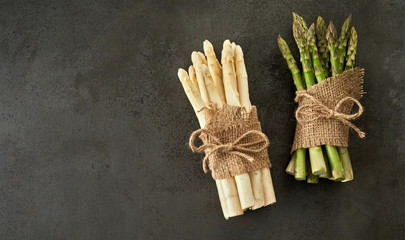 Bunches of fresh green and white asparagus spears