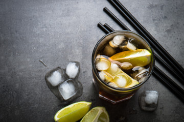 Cuba libre on dark background. 