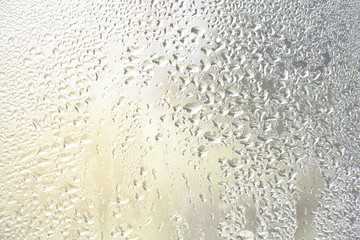 Water drops in the glass surface