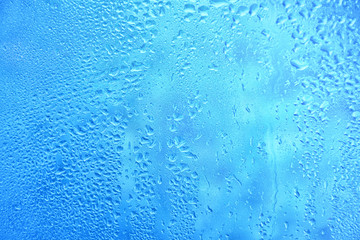 Water drops in the glass surface