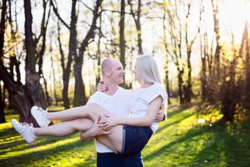 Happy romantic couple in park